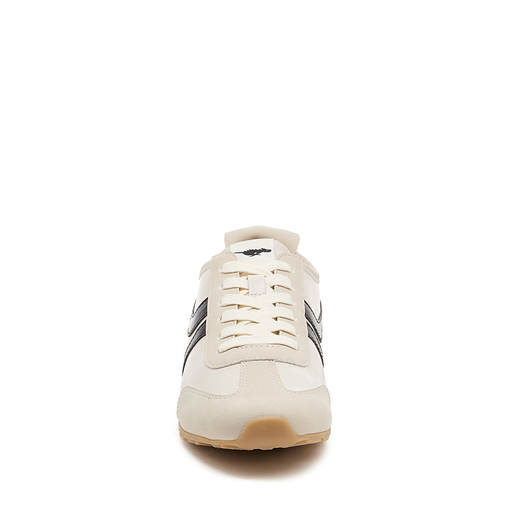 White women's sneaker with Rocket Dog comfort, playful style