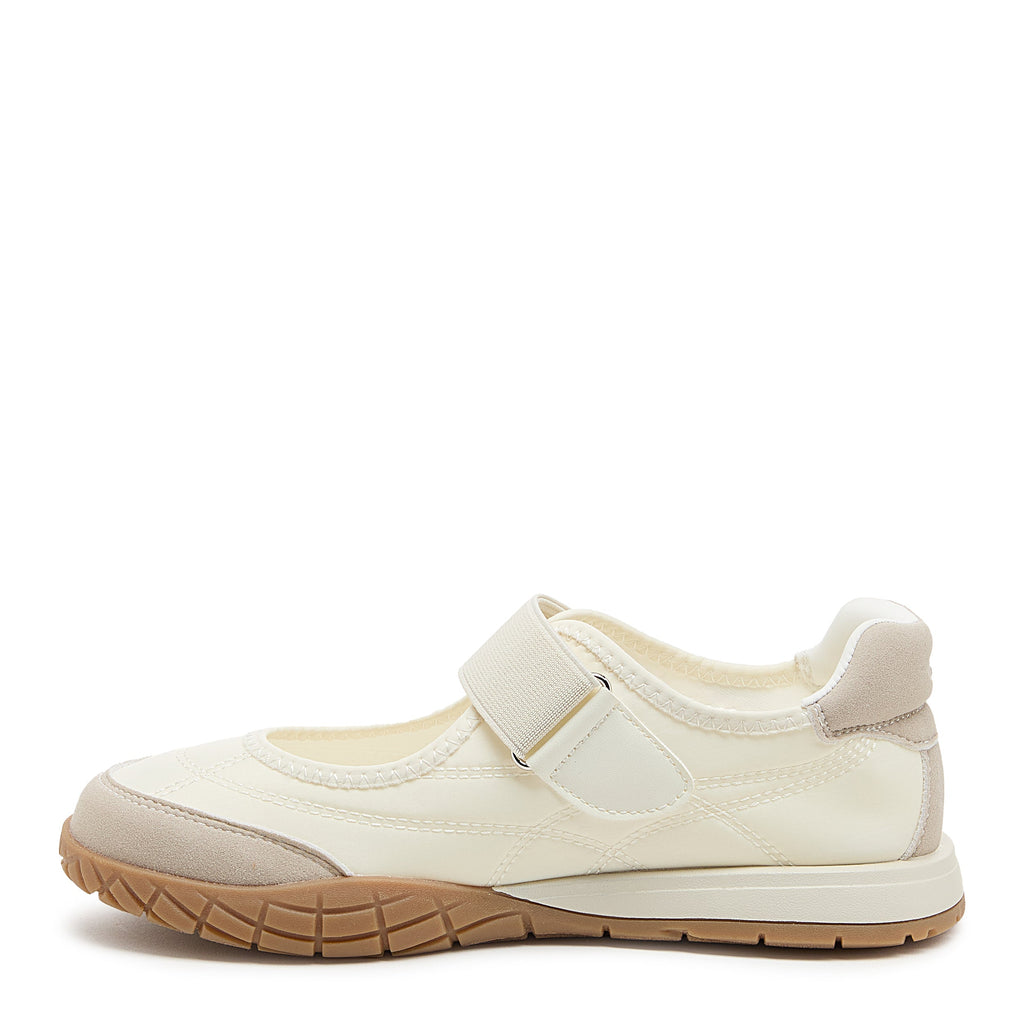 White sneaker with cushioned footbed, women's playful style – Rocket Dog Rex