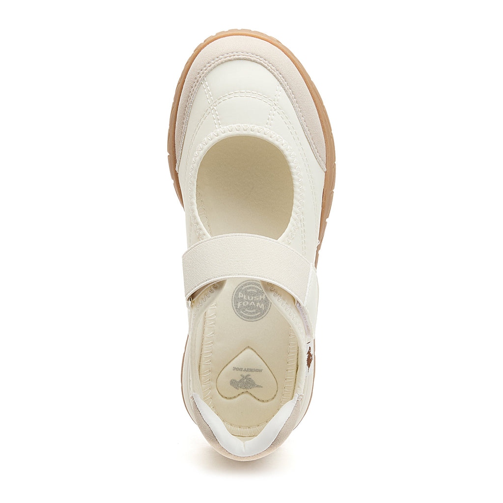 White women's sneaker with Rocket Dog comfort, playful style
