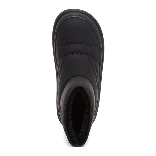 Top-down view of the Ryder black slipper boot showing the shearling lining