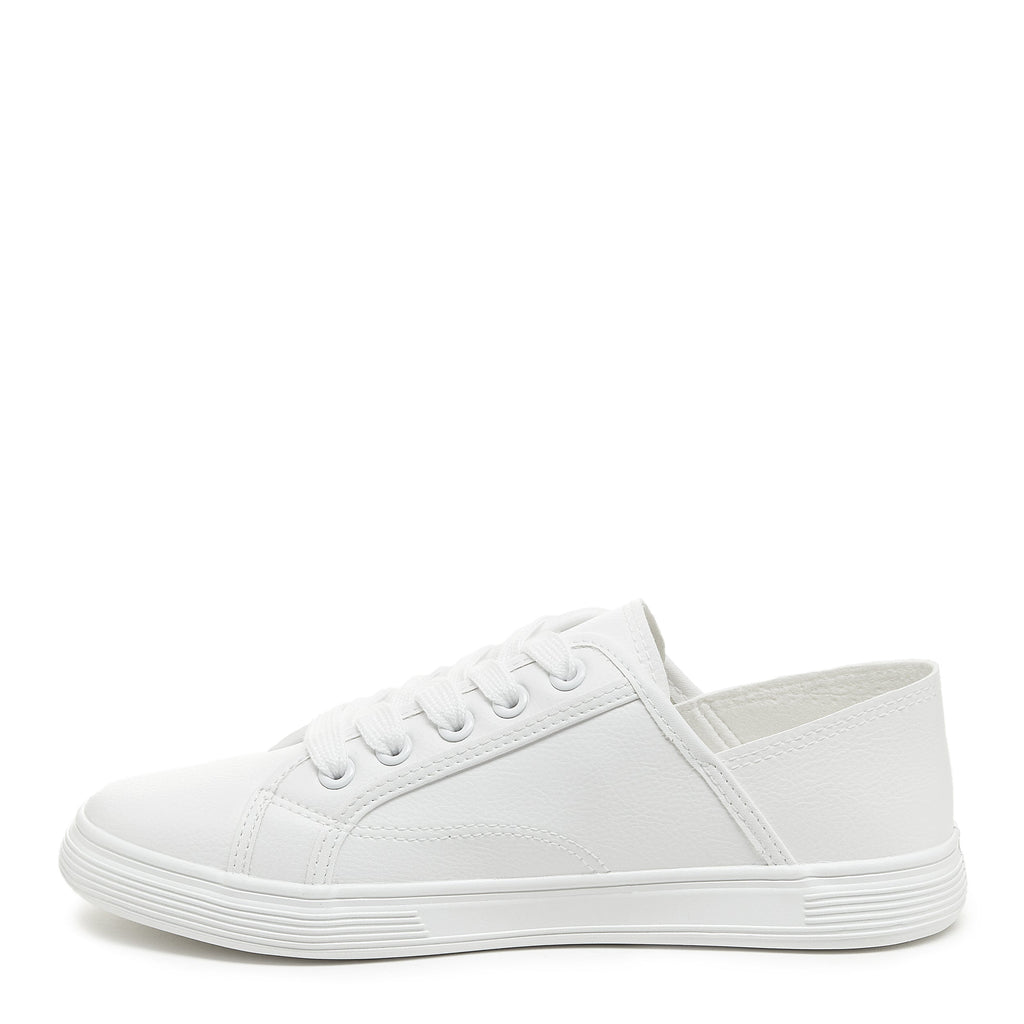 Inner side of the Zandra White sneaker with white rubber sole